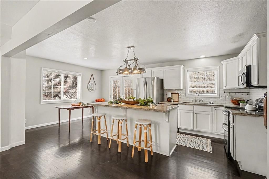 Photo of 2900 E RED BRIDGE Road, Kansas City, MO 64137 (MLS # 2598178)