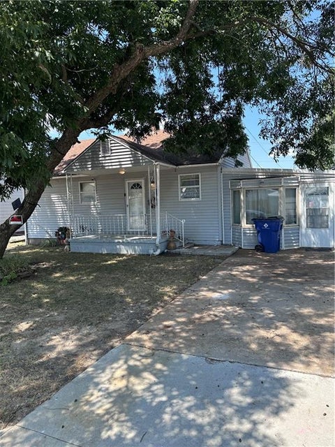 Photo of 1914 W 5th Street, Coffeyville, KS 67337 (MLS # 2636394)