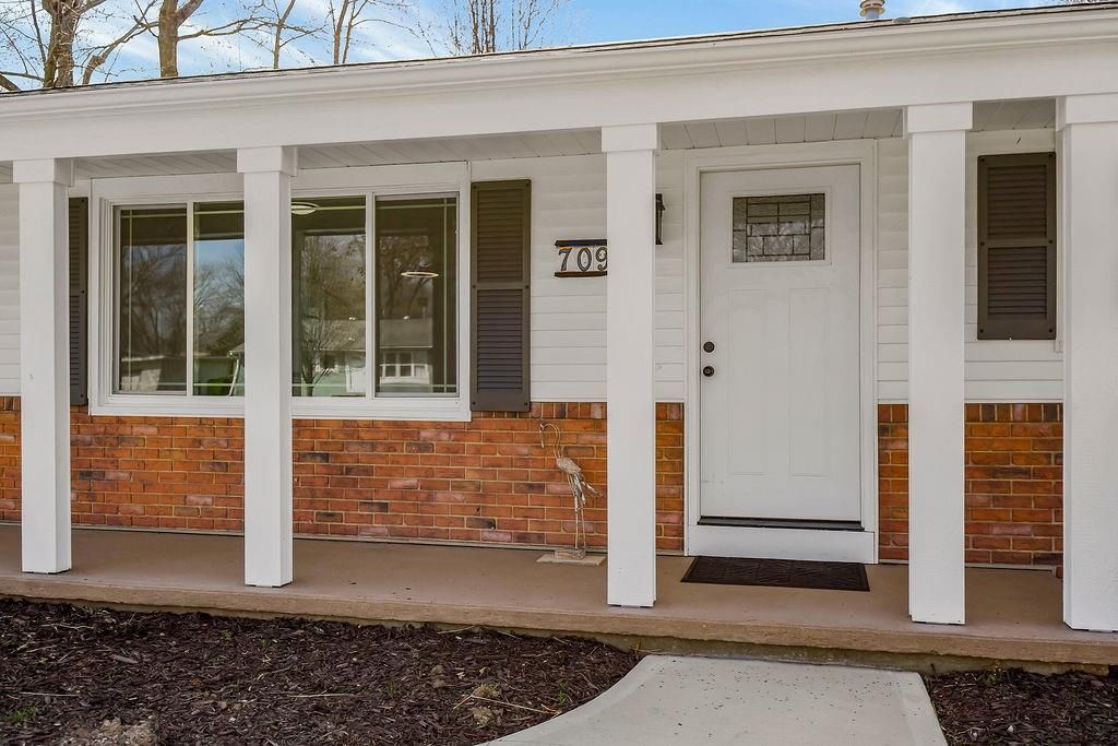 Photo of 709 W Clay Street, Harrisonville, MO 64701 (MLS # 2608757)