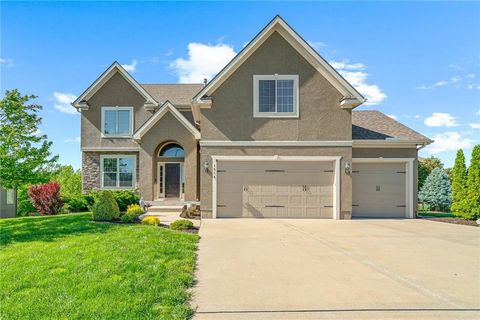 Photo of 1518 Creekmoor Drive, Raymore, MO 64083 (MLS # 2619529)