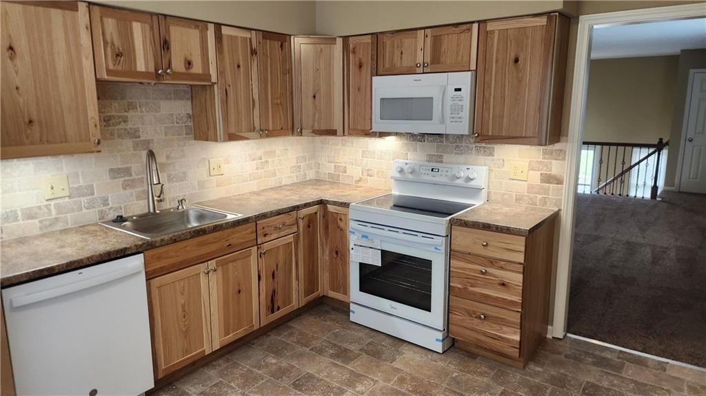 Photo of 8736 N HULL Avenue, Kansas City, MO 64154 (MLS # 2608969)