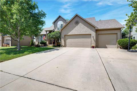 Photo of 826 Trailway Drive, Raymore, MO 64083 (MLS # 2638244)