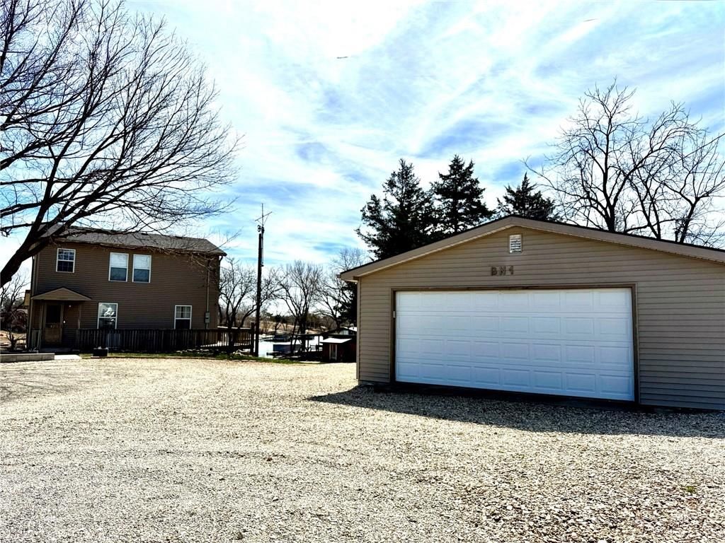 Photo of 100 Inlet Cove, Council Grove, KS 66846 (MLS # 2608469)