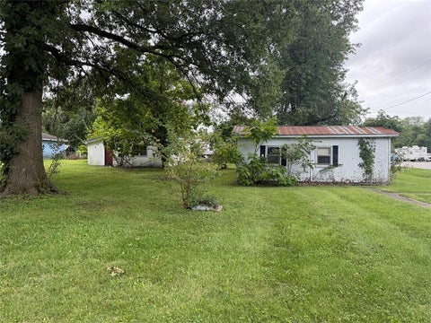 Photo of 813 Elm Street, Henrietta, MO 64036 (MLS # 2644145)