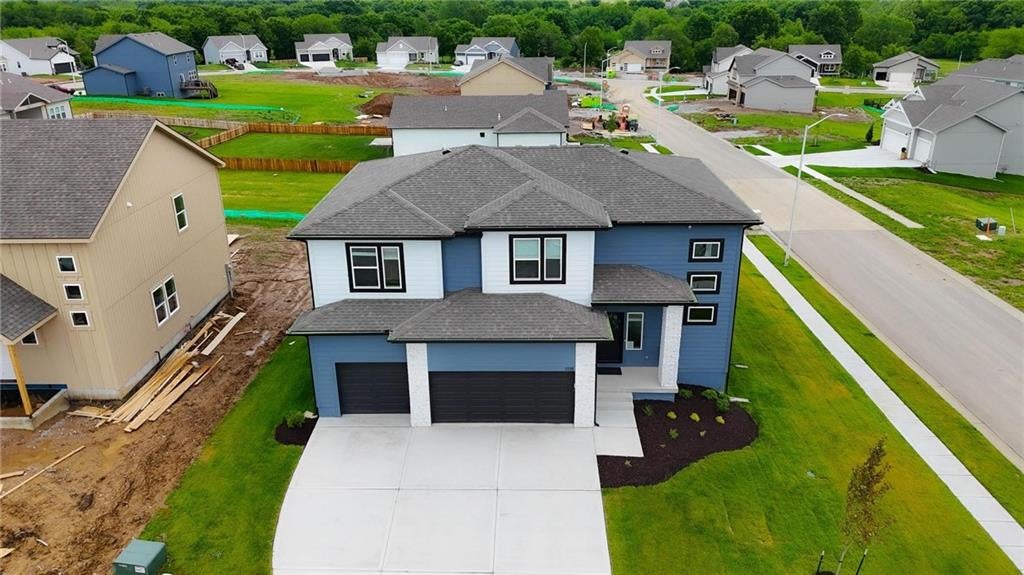 Photo of 11115 N Glenwood Avenue, Kansas City, MO 64157 (MLS # 2627199)
