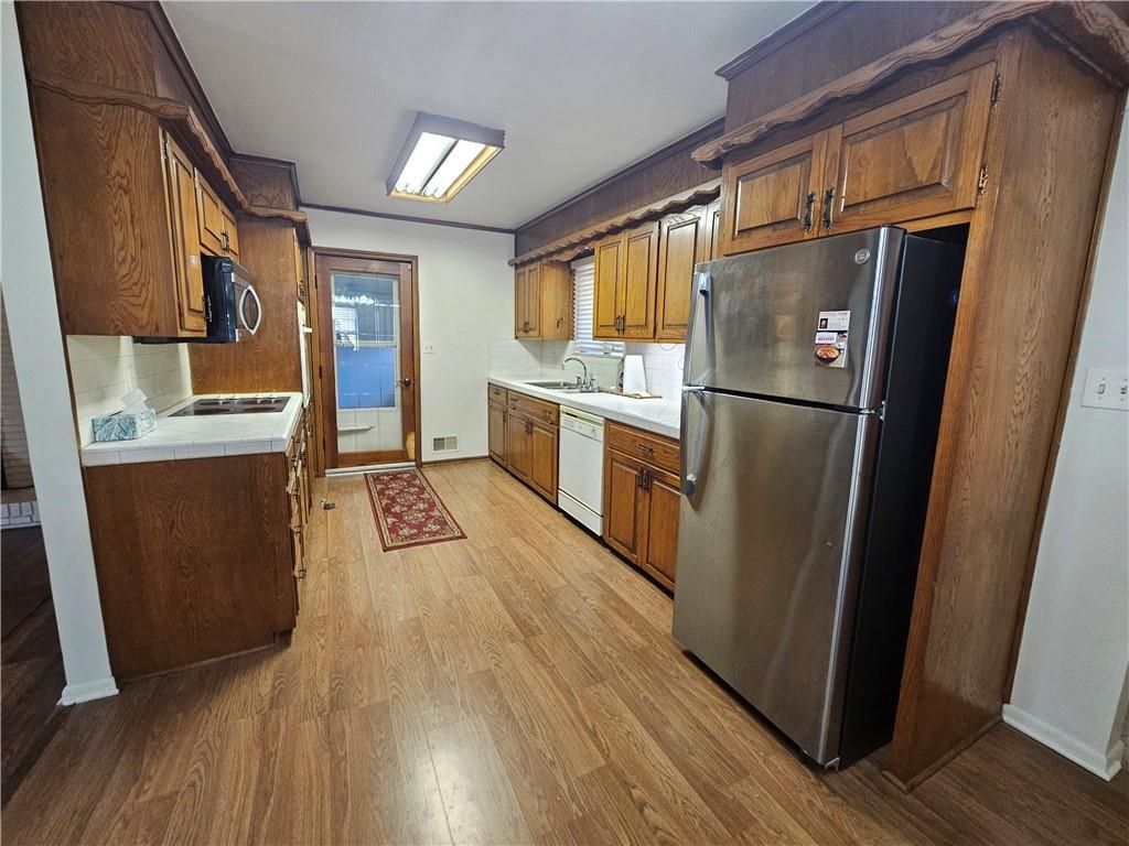 Photo of 7308 Cedar Avenue, Raytown, MO 64133 (MLS # 2591626)