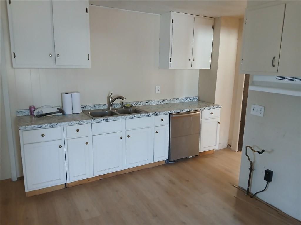 Photo of 114 N Main Street, Liberal, MO 64762 (MLS # 2596883)