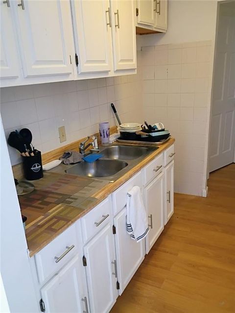 Photo of 5417 NORLEDGE Avenue, Kansas City, MO 64123 (MLS # 2617929)