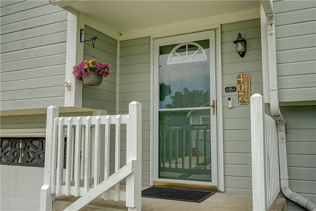 Photo of 407 SW 24th Terrace, Oak Grove, MO 64075 (MLS # 2618520)