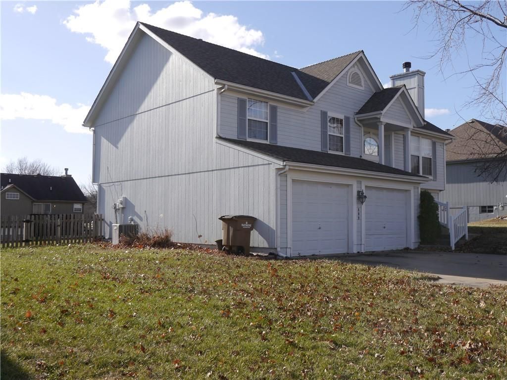 Photo of 809 Stratford Drive, Raymore, MO 64083 (MLS # 2592603)