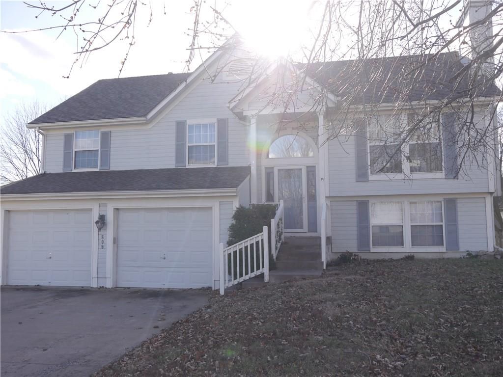 Photo of 809 Stratford Drive, Raymore, MO 64083 (MLS # 2592603)
