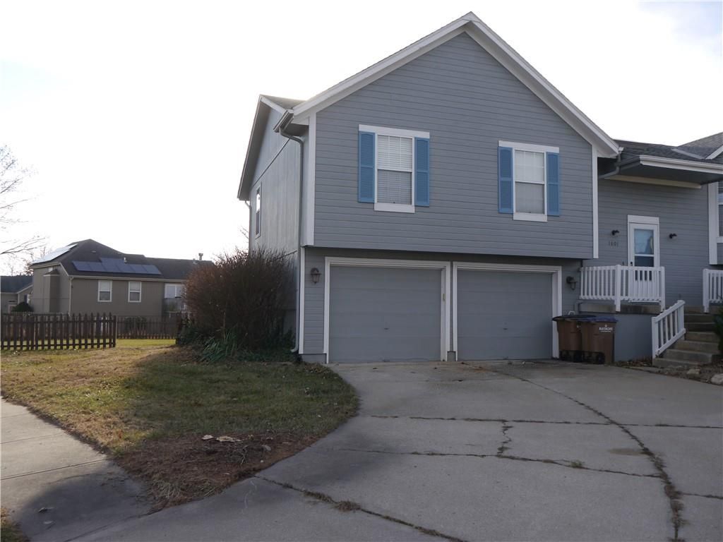 Photo of 1601 Stasi Avenue, Raymore, MO 64083 (MLS # 2592510)