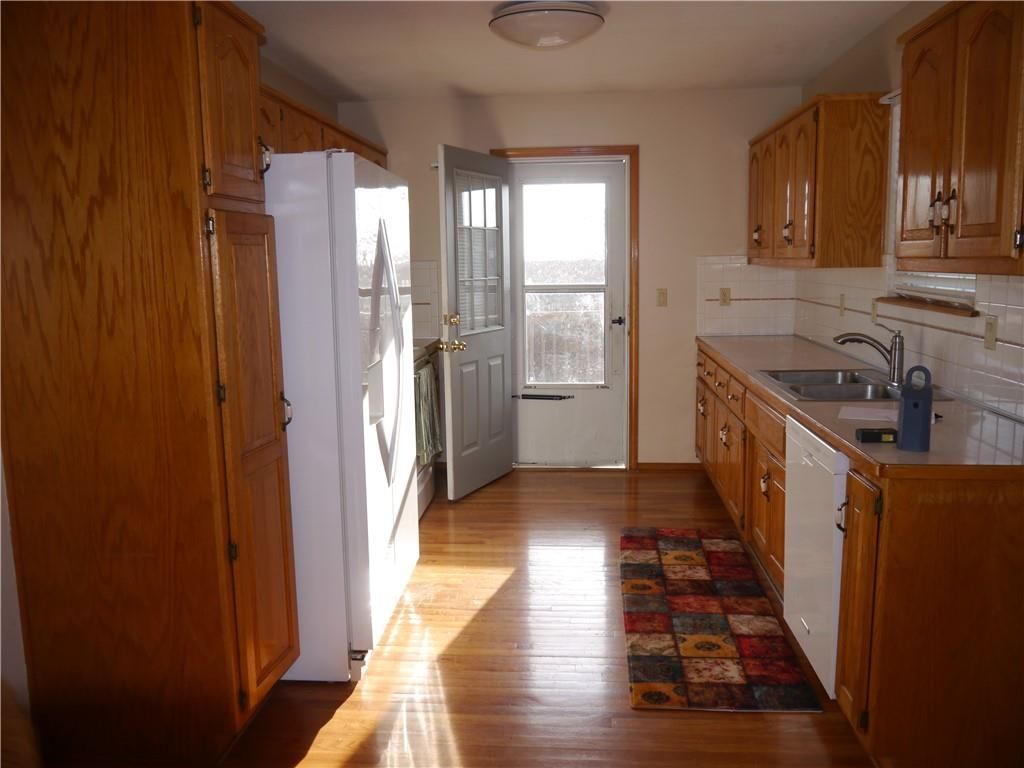 Photo of 1601 Stasi Avenue, Raymore, MO 64083 (MLS # 2592510)