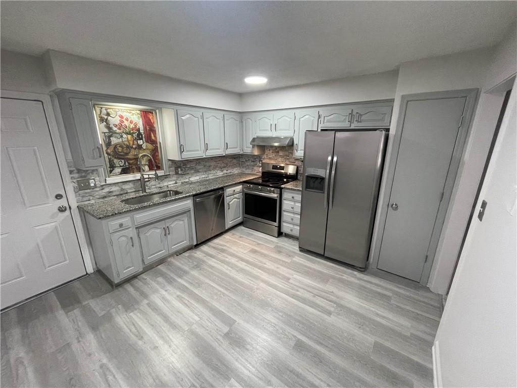 Photo of 12506 Winchester Avenue, Grandview, MO 64030 (MLS # 2607791)