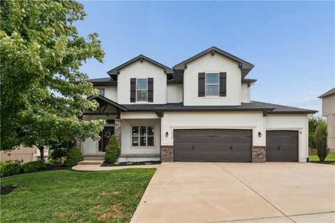 Photo of 1115 Metfield Lane, Raymore, MO 64083 (MLS # 2636091)