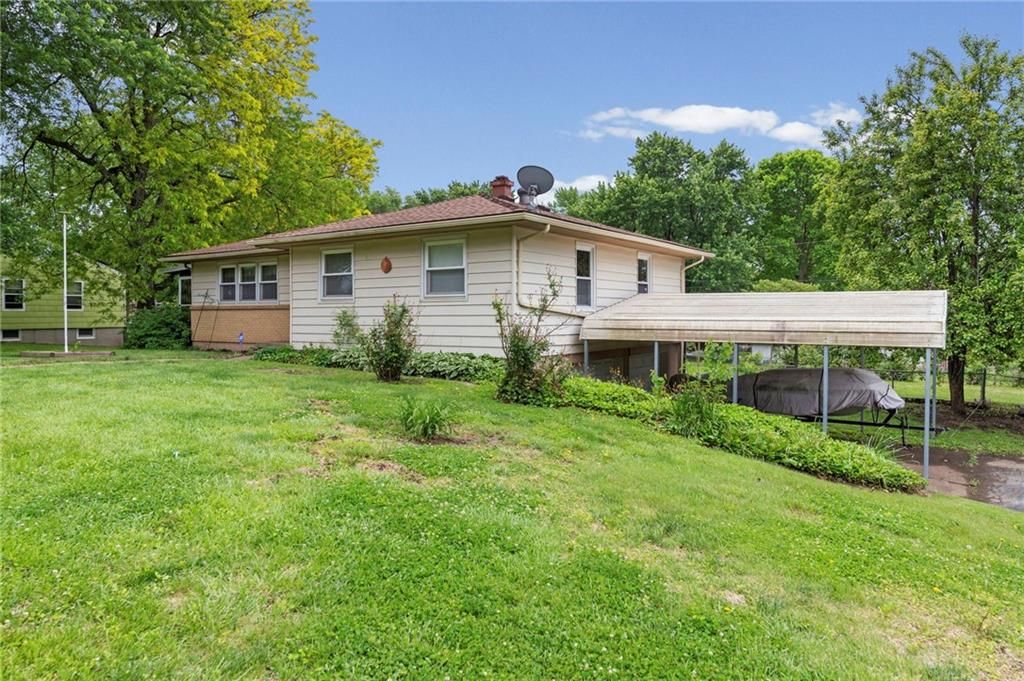 Photo of 12409 E 54th Street, Kansas City, MO 64133 (MLS # 2618507)
