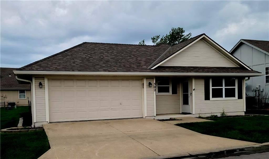 Photo of 502 S Poseidon Way, Raymore, MO 64083 (MLS # 2615025)