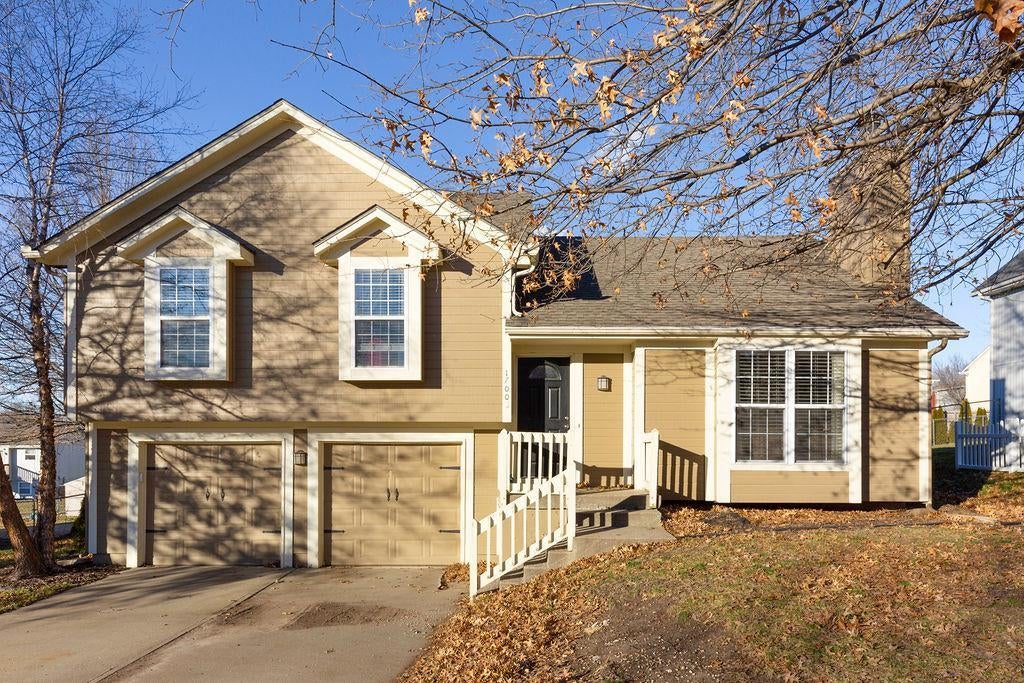 Photo 1 of 28 — 1700 Cooper Drive, Raymore, MO 64083