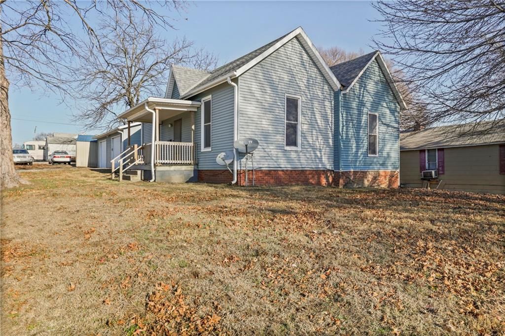 Photo of 2203 Walnut Street, Higginsville, MO 64037 (MLS # 2592220)