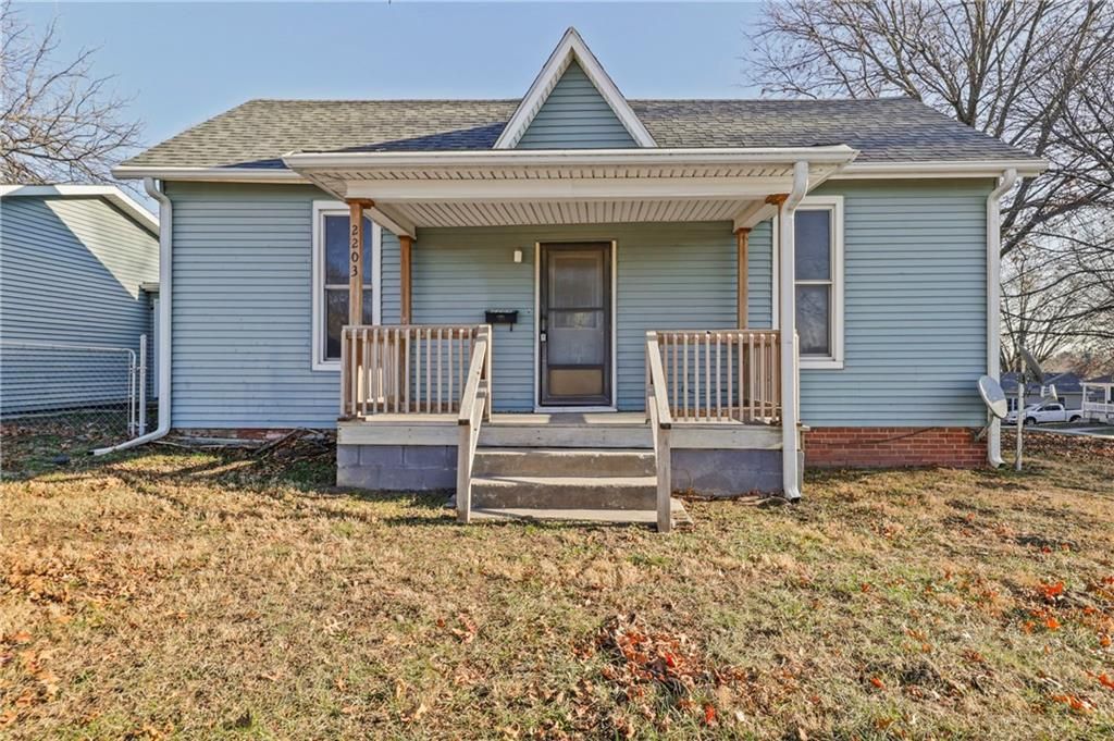 Photo of 2203 Walnut Street, Higginsville, MO 64037 (MLS # 2592220)