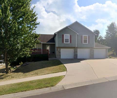 Photo of 1301 Sawgrass Drive, Grain Valley, MO 64029 (MLS # 2636809)