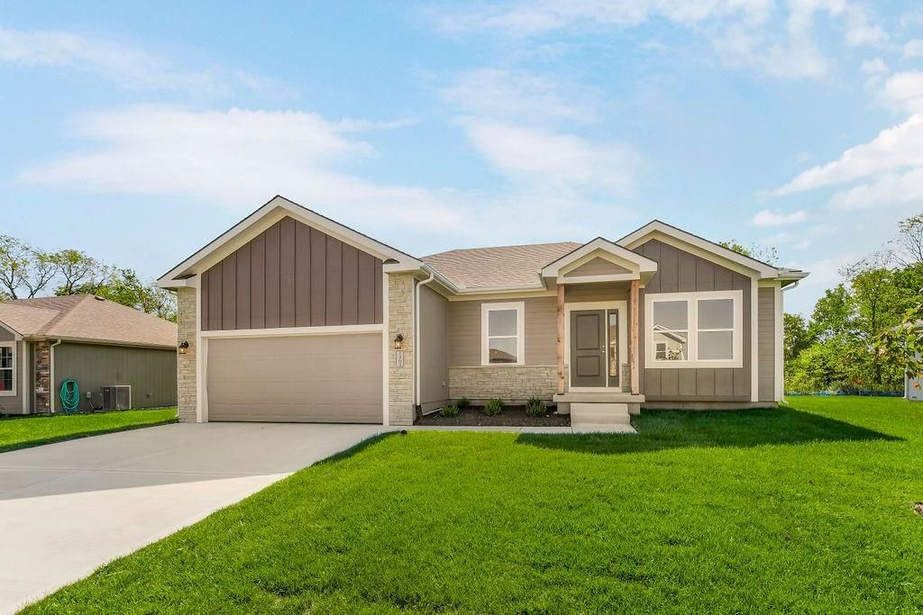 Photo of 704 Blazing Star Drive, Raymore, MO 64083 (MLS # 2620014)