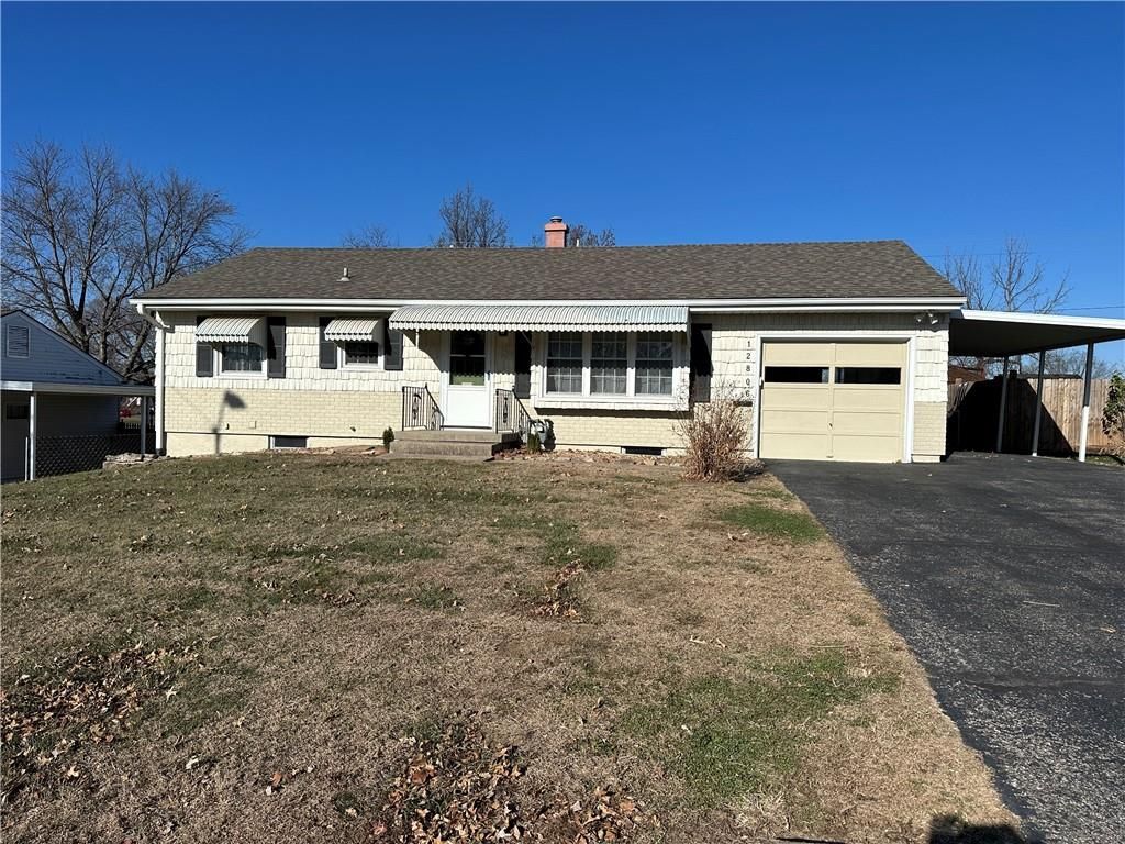 Photo of 12806 E 33 Street S, Independence, MO 64055 (MLS # 2592195)