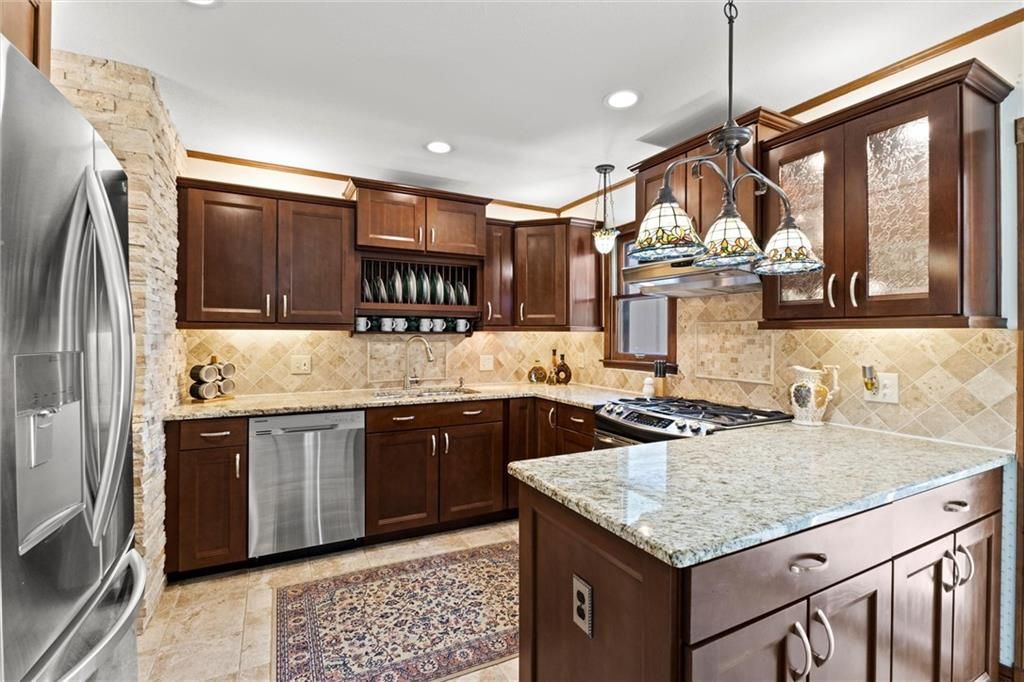 Photo of 8403 E 110th Terrace, Kansas City, MO 64134 (MLS # 2623394)