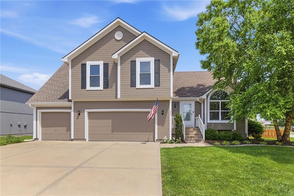 Photo of 507 River Birch Road, Raymore, MO 64083 (MLS # 2623556)