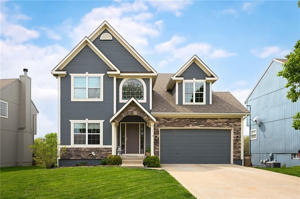 Photo of 712 S Adams Street, Raymore, MO 64083 (MLS # 2618418)