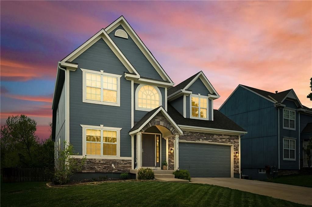 Photo of 712 S Adams Street, Raymore, MO 64083 (MLS # 2618418)