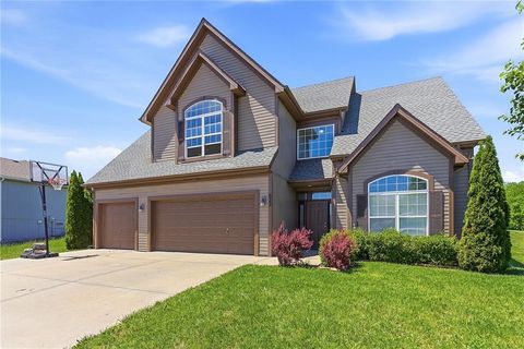 Photo of 622 Johnston Parkway, Raymore, MO 64083 (MLS # 2620358)