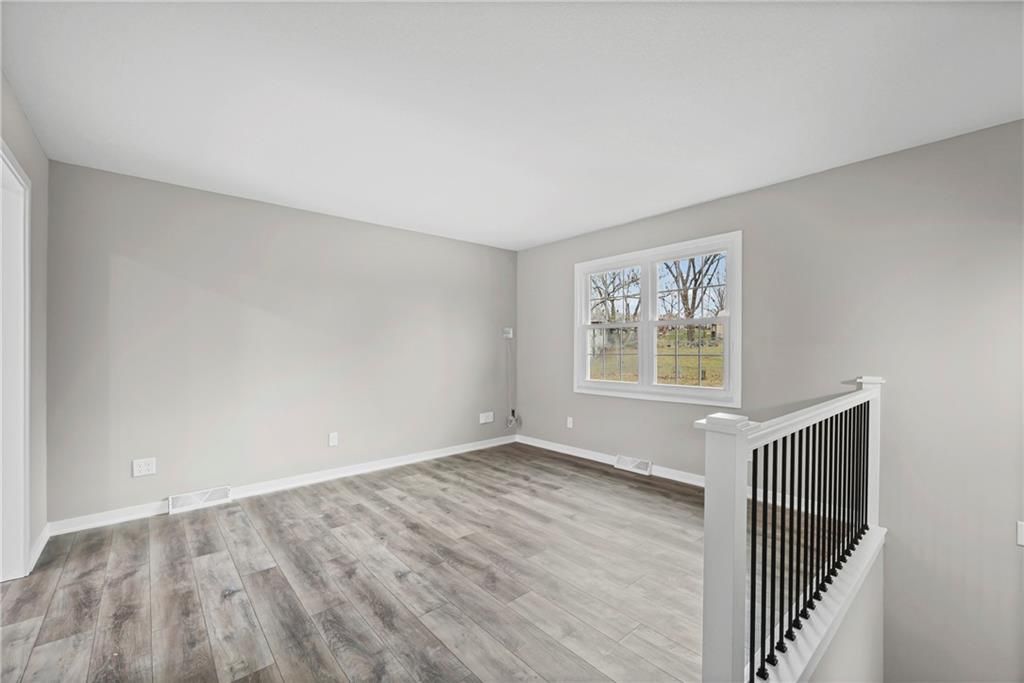 Photo of 805 NW Castle Drive, Blue Springs, MO 64015 (MLS # 2591998)