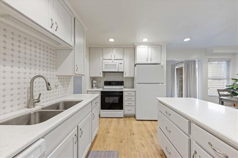 Photo of 10124 W 96th Street #A, Overland Park, KS 66212 (MLS # 2638057)
