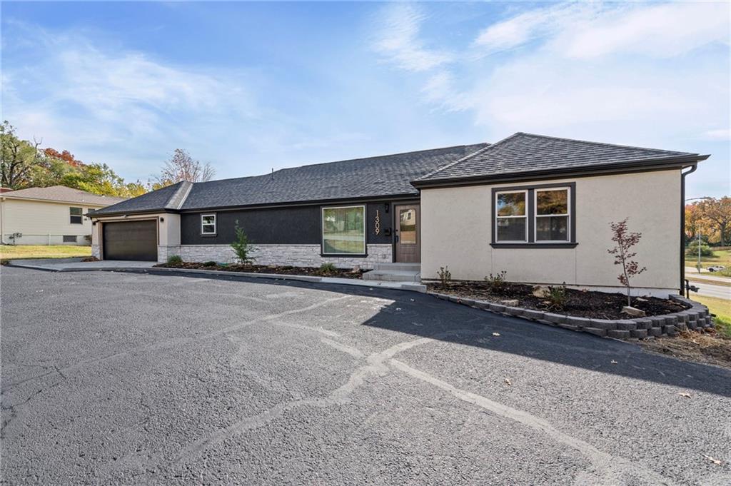 1309 W 100TH Terrace