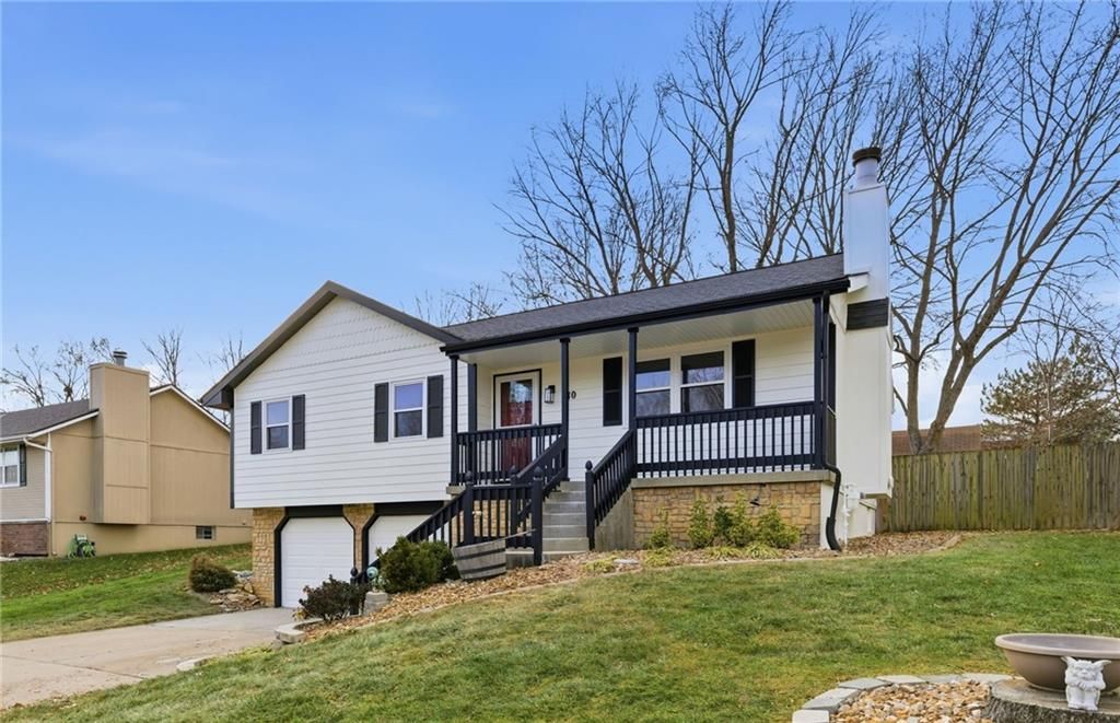 Photo of 310 N Darrowby Drive, Raymore, MO 64083 (MLS # 2592244)