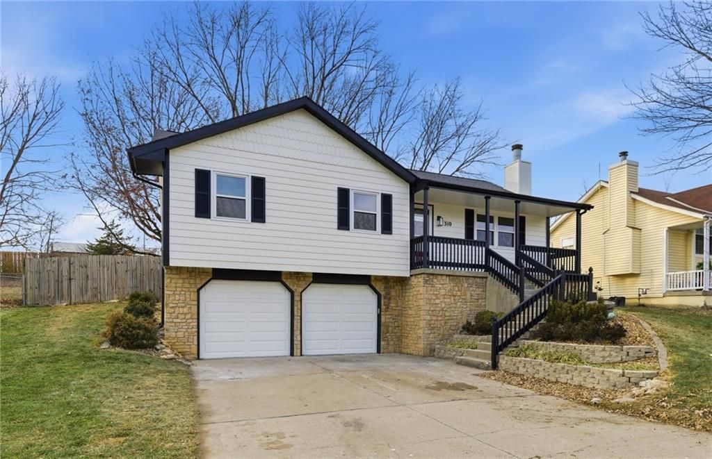 Photo of 310 N Darrowby Drive, Raymore, MO 64083 (MLS # 2592244)