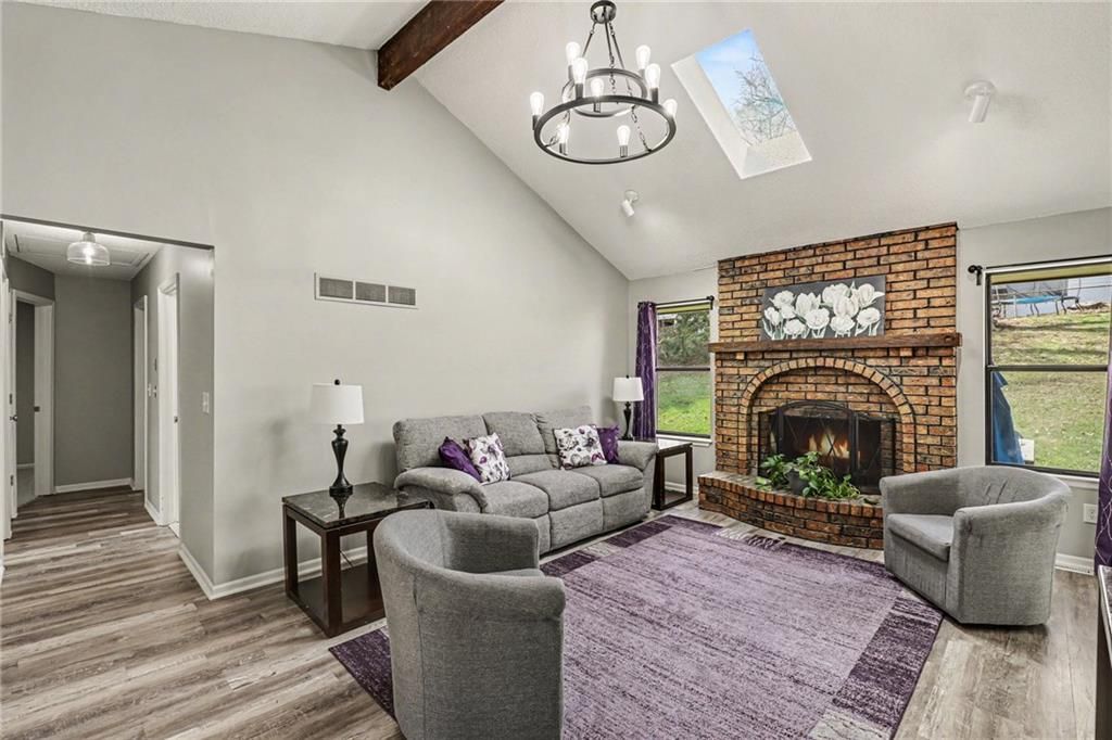 Photo of 117 SE 2nd Street, Blue Springs, MO 64014 (MLS # 2607843)