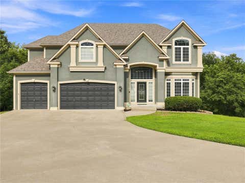 Photo of 5822 NE Timber Hills Drive, Lees Summit, MO 64064 (MLS # 2637123)