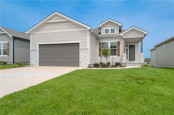 1148 SW WHITBY DR, RAYMORE, MO 64083 - Image fc3acbdaec2e9c5876bde0ed56cd07d9/1312202046
