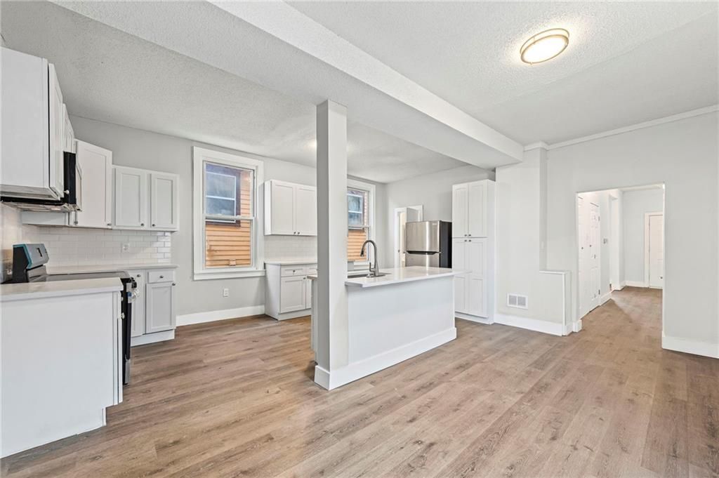 Photo of 512 Ottawa Street, Leavenworth, KS 66048 (MLS # 2592383)