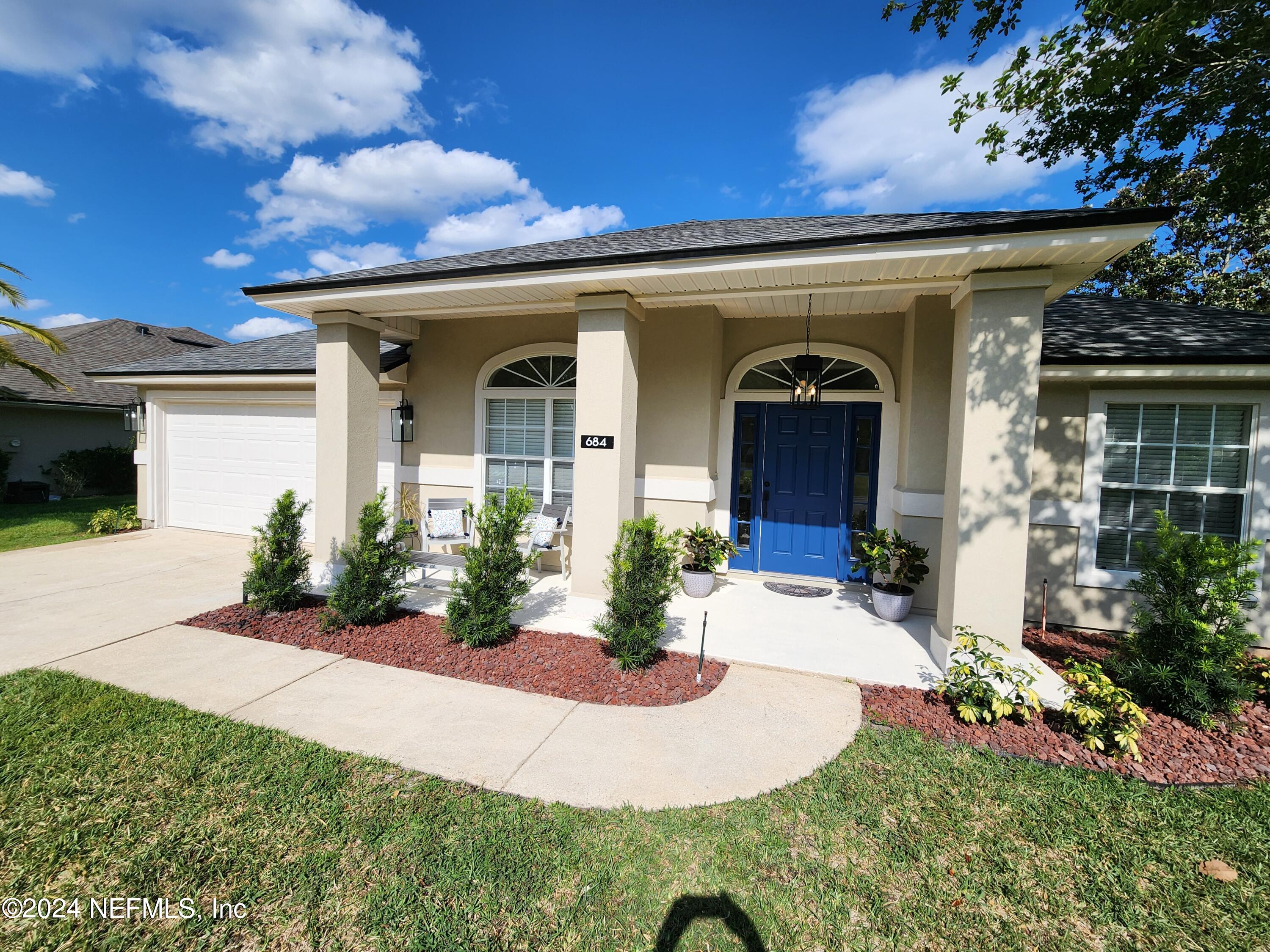 St Johns, FL home for sale located at 684 Grand Parke Drive, St Johns, FL 32259