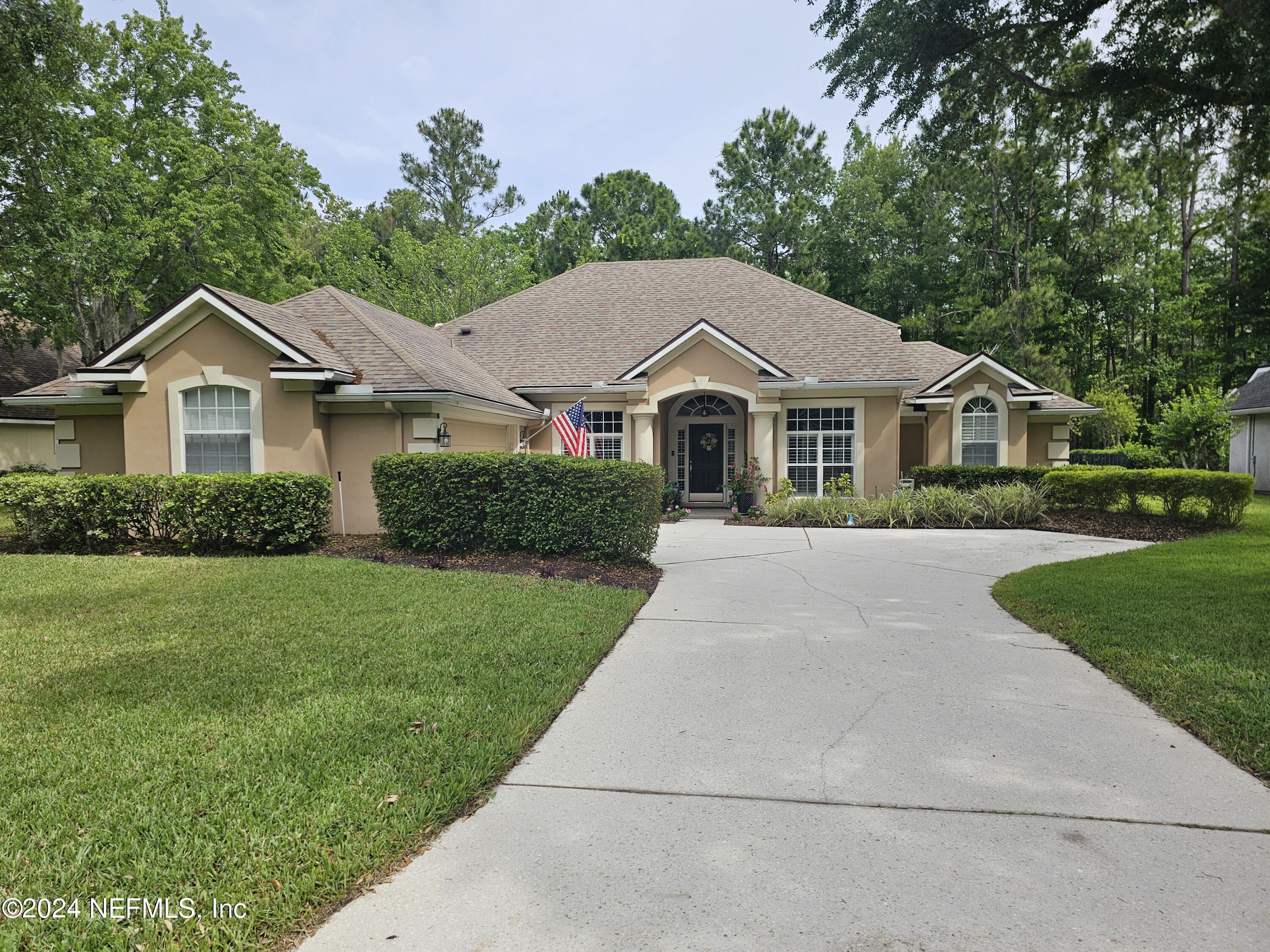 Fleming Island, FL home for sale located at 1624 MISTY LAKE Drive, Fleming Island, FL 32003