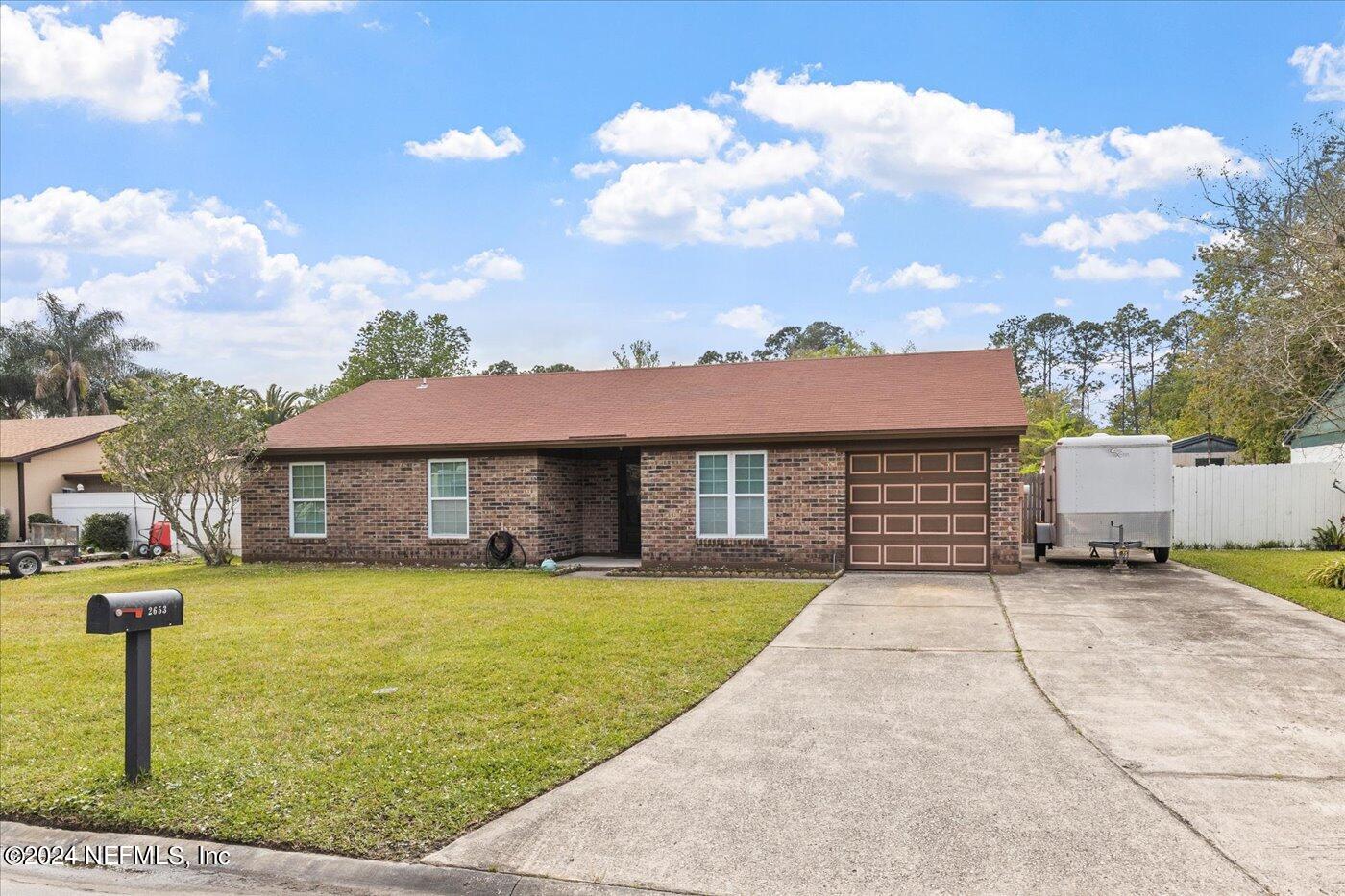 Middleburg, FL home for sale located at 2653 E PINEWOOD Boulevard, Middleburg, FL 32068