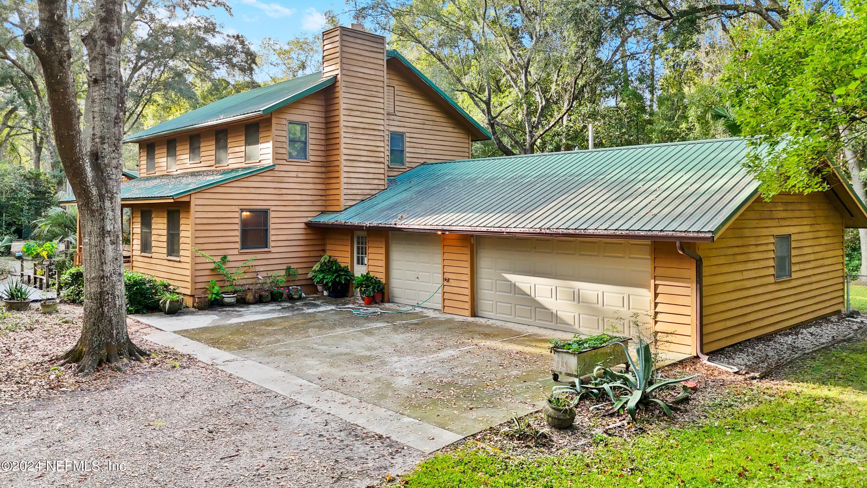 7816 WHISPERING PINES Lane