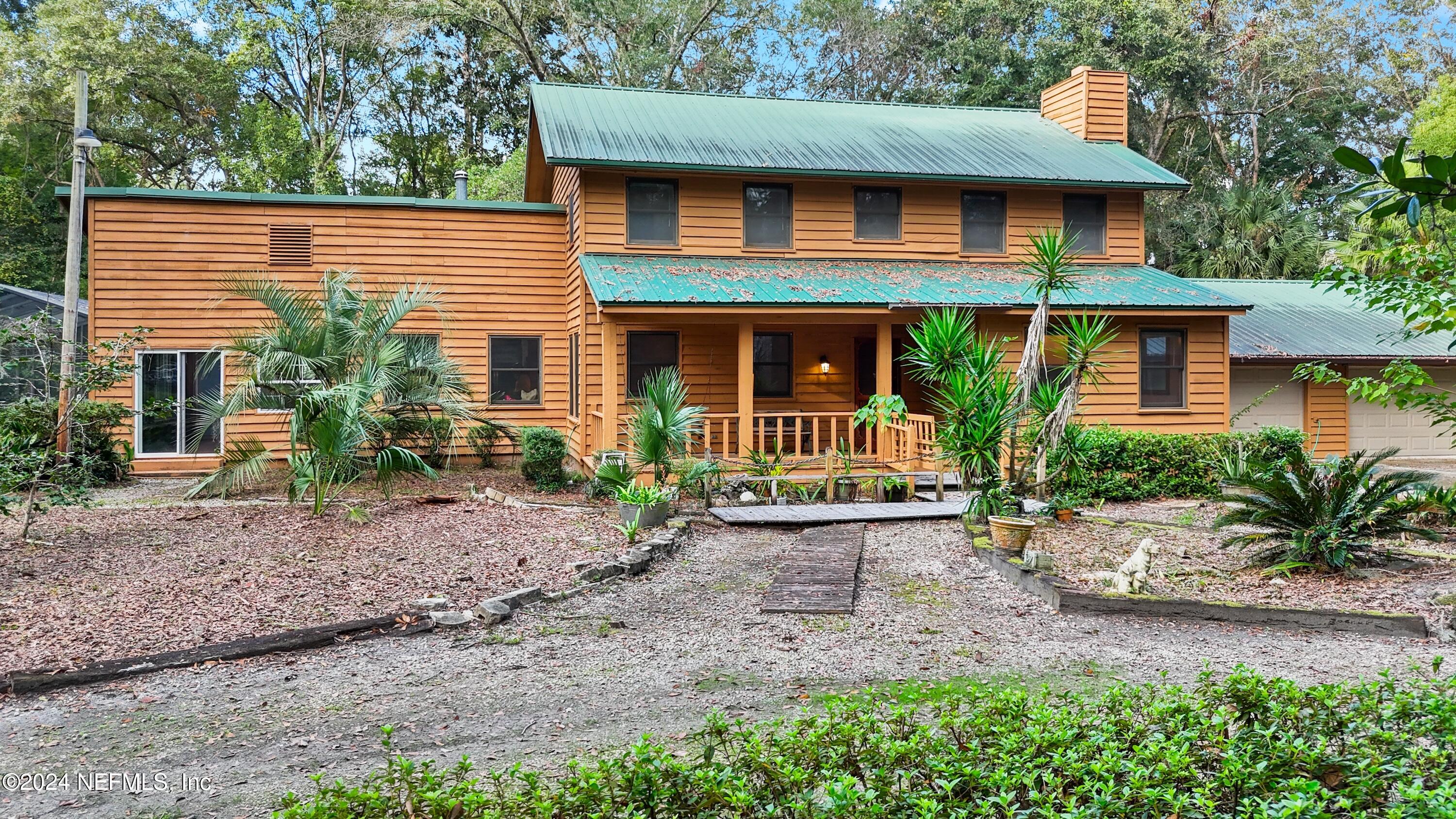 7816 WHISPERING PINES Lane