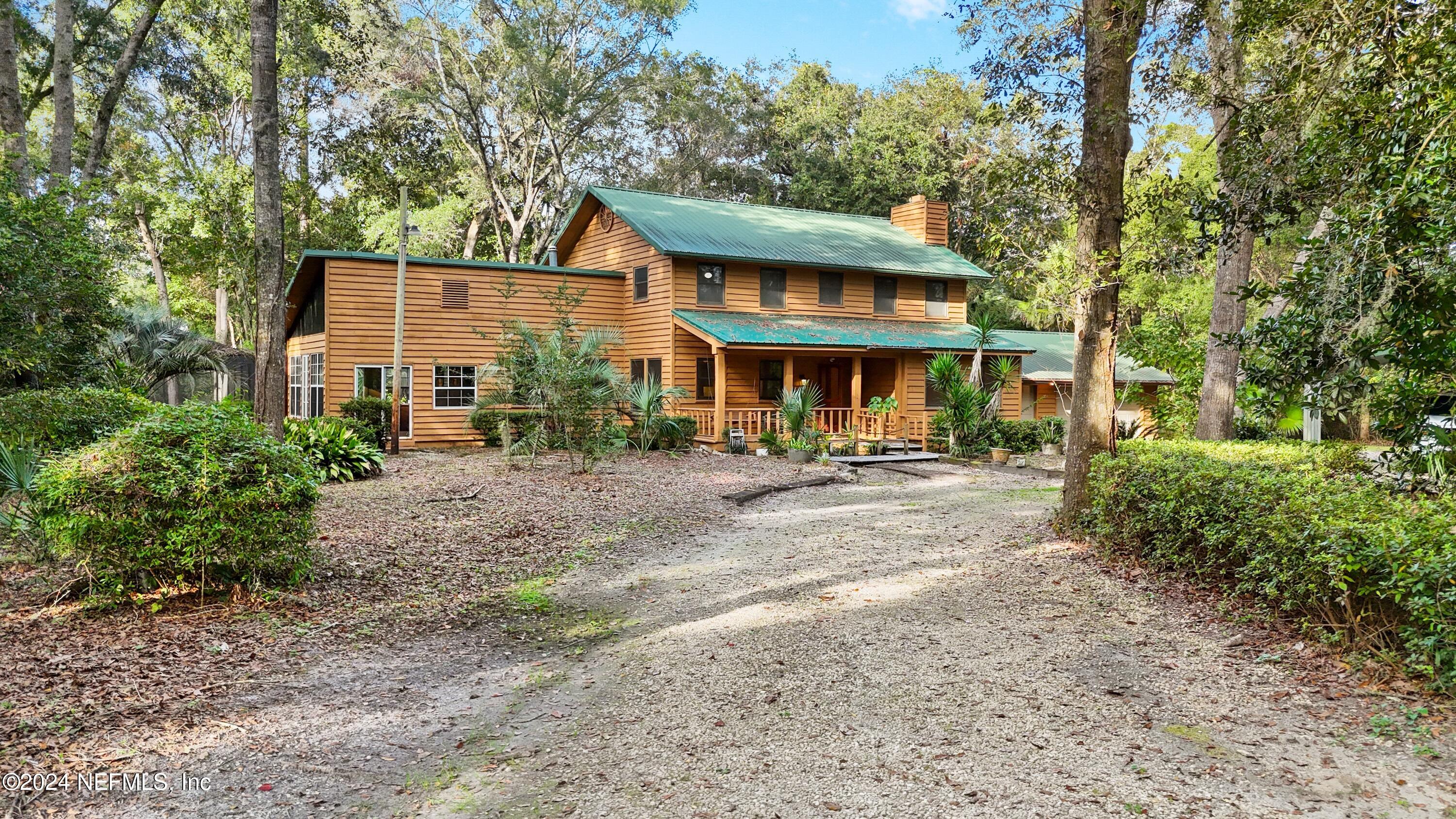 7816 WHISPERING PINES Lane