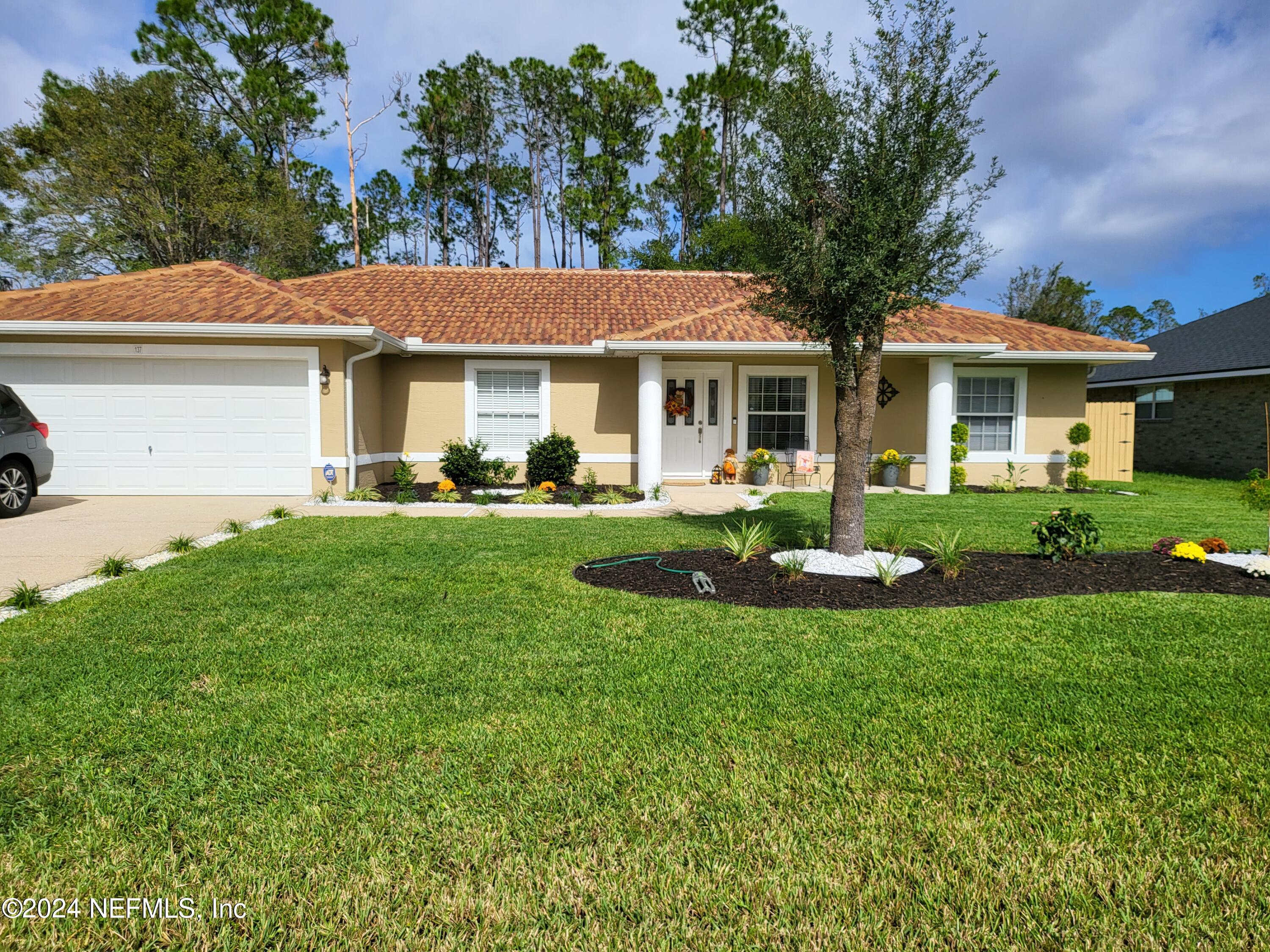 Palm Coast, FL home for sale located at 137 Red Mill Drive, Palm Coast, FL 32164