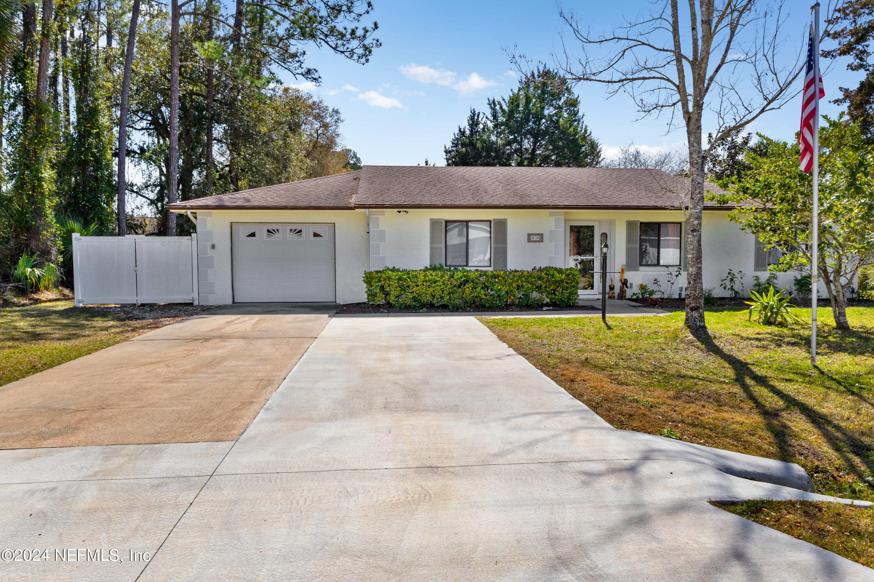 Palm Coast, FL home for sale located at 58 BARKWOOD Lane, Palm Coast, FL 32137