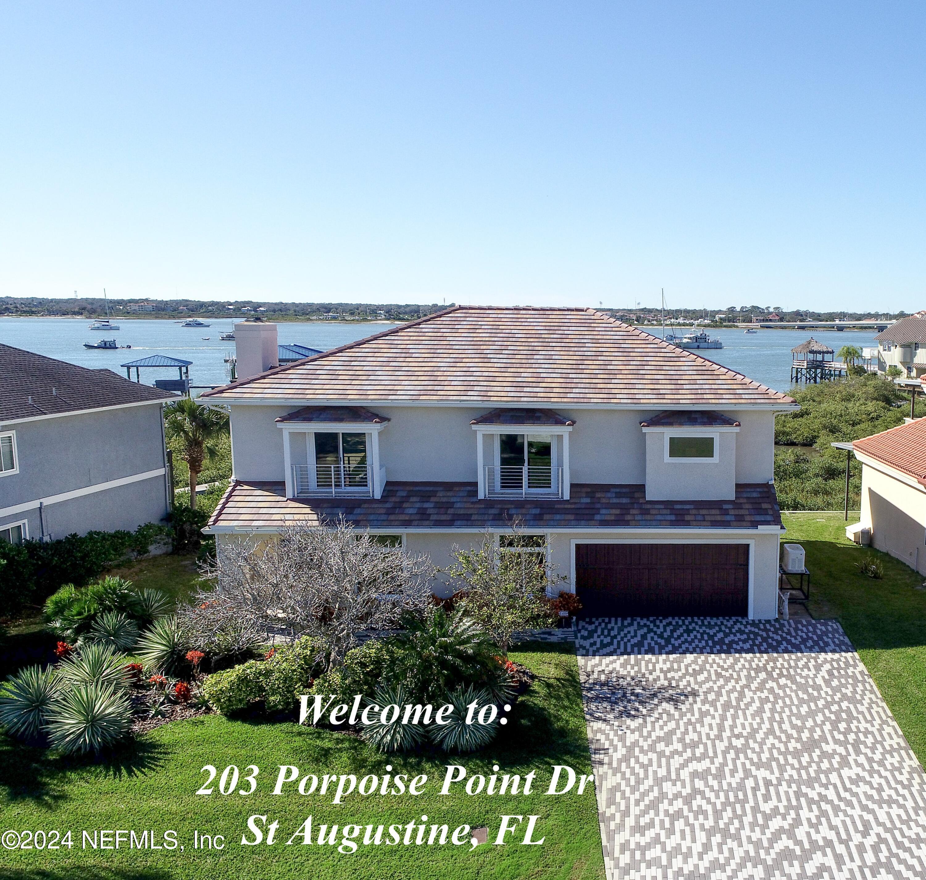 St Augustine, FL home for sale located at 203 Porpoise Point Drive, St Augustine, FL 32084